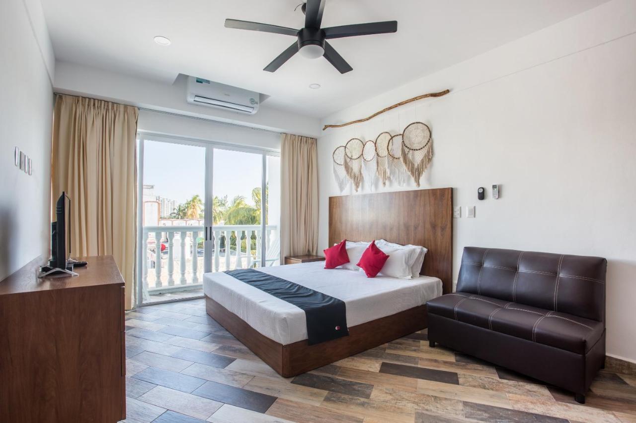 Capital O Cancun Ocean View, 칸쿤 외부 사진 A typical room at the hotel