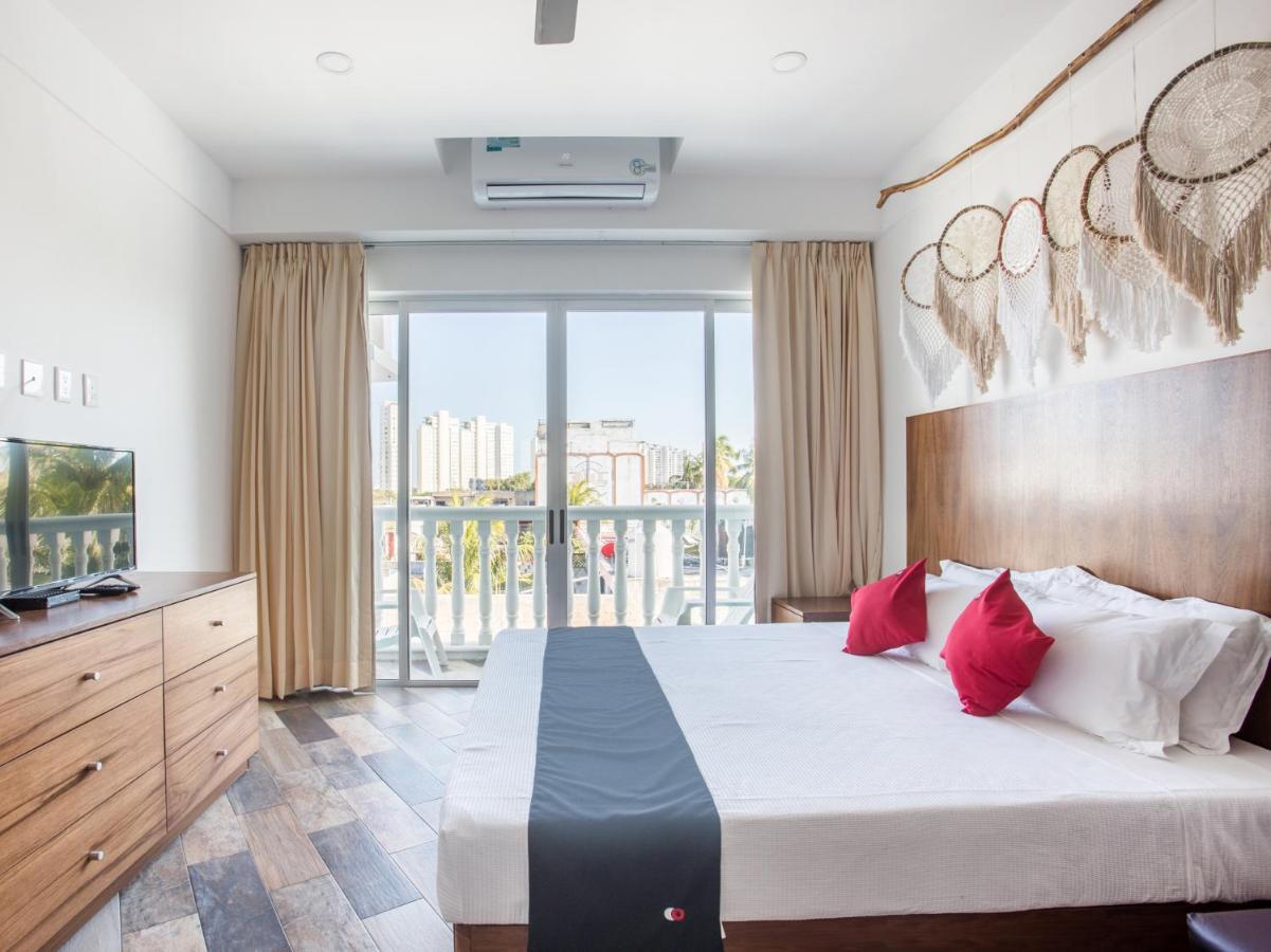 Capital O Cancun Ocean View, 칸쿤 외부 사진 A bedroom at the hotel